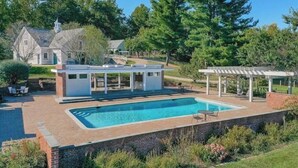 A house with a swimming pool, a covered patio, and a large lawn. - Farm Stay with Horses & Pool with Mountaintop Views (Bloomfield)