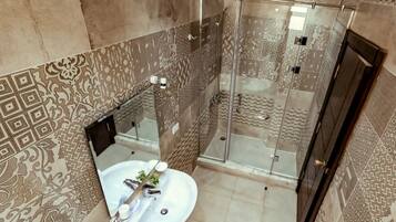 Shower, rainfall showerhead, eco-friendly toiletries, slippers