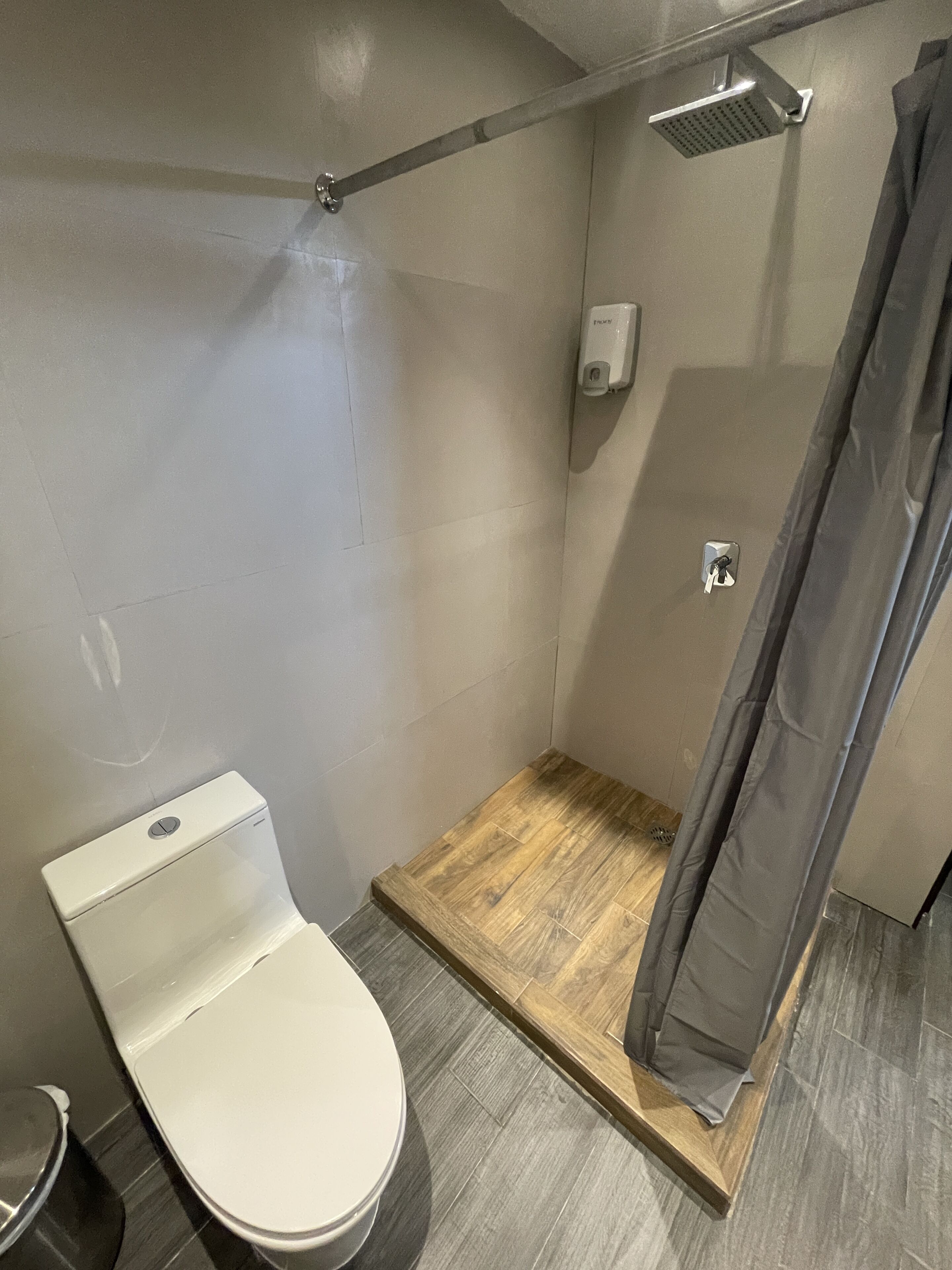 economy double room, 2 queen beds | bathroom | shower, free toiletries, towels, soap