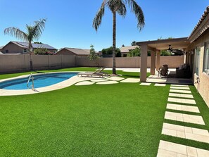Outdoor pool, a heated pool - Renovated & Spacious 4Bed/3Bath Entertainers Home w/ HEATED Pool (Peoria)