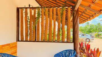 Classic Chalet, 1 Double Bed, Lanai, Garden View | 1 bedroom, free WiFi, bed sheets