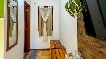 Quarto triplo conforto, vista para o jardim | 1 quarto, Wi-Fi de cortesia, roupa de cama