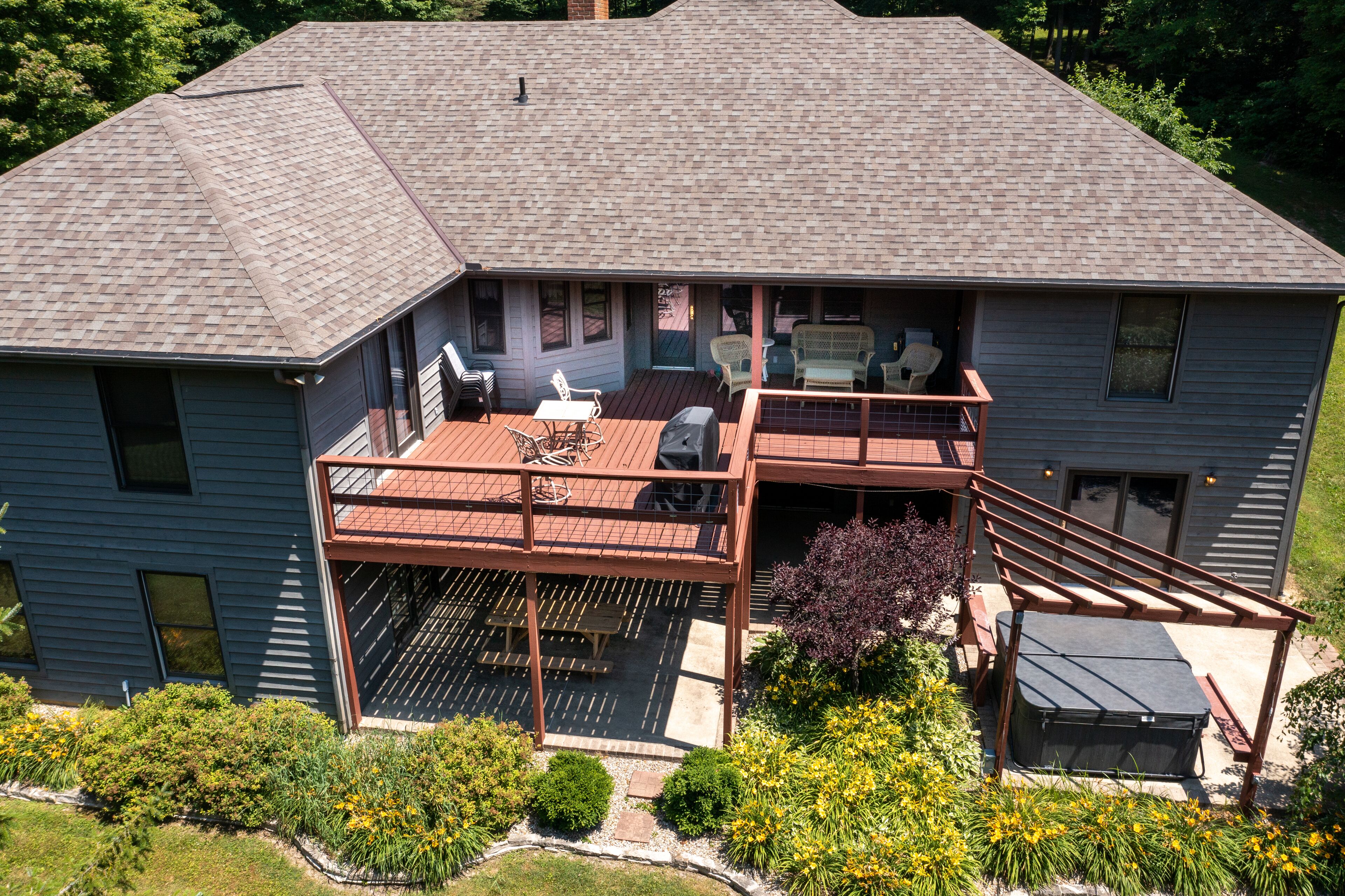 Large deck and patio, with great views.