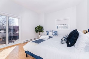 1 bedroom, desk, iron/ironing board, travel crib