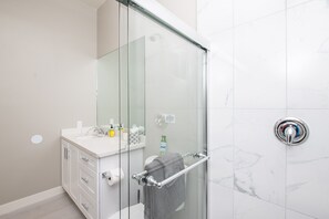 Bathtub, hair dryer, towels, soap