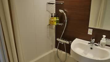 Combined shower/tub, hair dryer, electronic bidet, towels