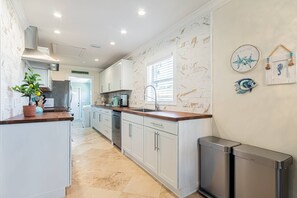 Fridge, microwave, dishwasher, coffee/tea maker