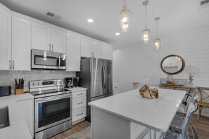 Fridge, microwave, dishwasher, coffee/tea maker