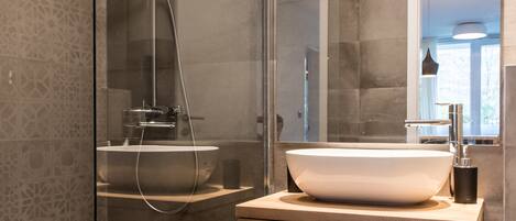 Shower, hair dryer, towels, soap