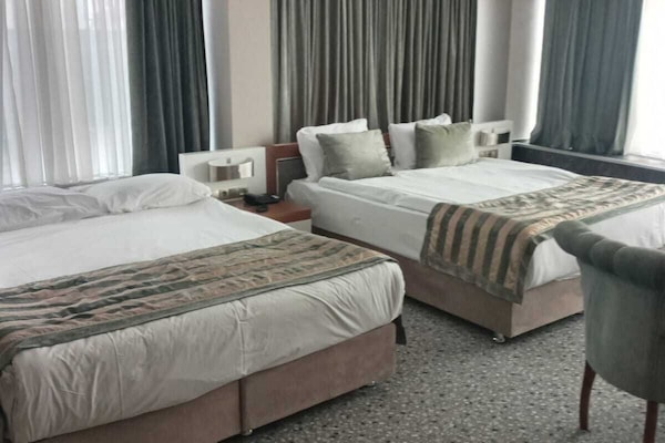 Family Room | In-room safe, individually decorated, individually furnished, free WiFi