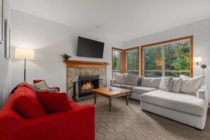 TV, fireplace - 2BR | Painted Cliff | Ski in/out | Communal Hot Tub | Wood Burning Fireplace | Free Parking (Whistler)