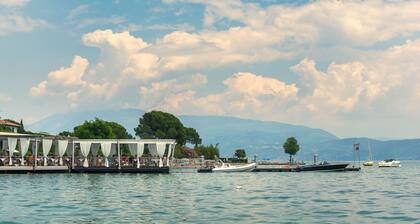 Mansion by Lake Garda with Pools & Olive Trees