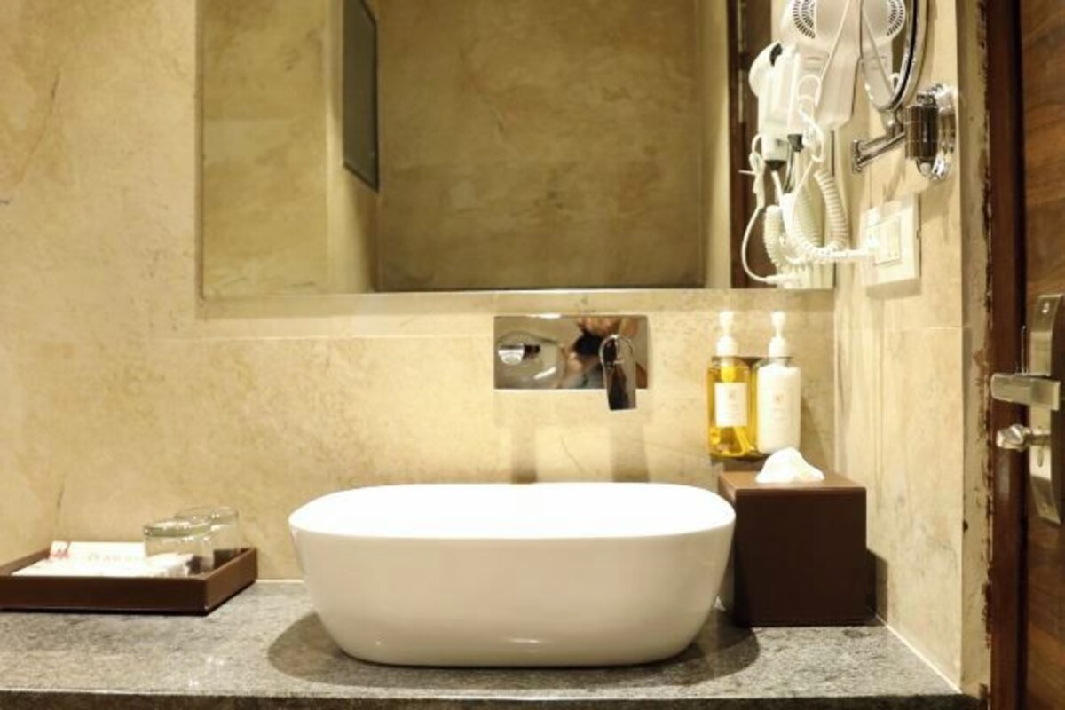 Shower, free toiletries, slippers, towels