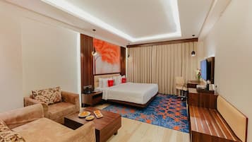 Kamar Premium | Seprai premium, brankas, meja kerja, dan ruang kerja ramah laptop