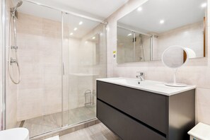 Hair dryer, towels, shampoo