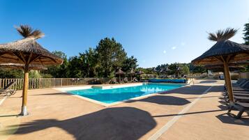 Seasonal outdoor pool, pool umbrellas, pool loungers