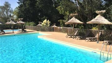 Seasonal outdoor pool, pool umbrellas, sun loungers