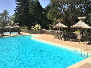 Seasonal outdoor pool, pool umbrellas, sun loungers