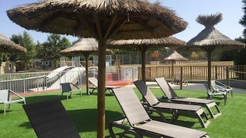 Seasonal outdoor pool, pool umbrellas, pool loungers