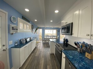 Fridge, microwave, oven, stovetop - Enjoy beautiful ocean views while staying at this spacious, 4 bedroom condo located just a few steps from the beach! (Ocean City)