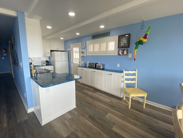 Fridge, microwave, oven, stovetop - Enjoy beautiful ocean views while staying at this spacious, 4 bedroom condo located just a few steps from the beach! (Ocean City)