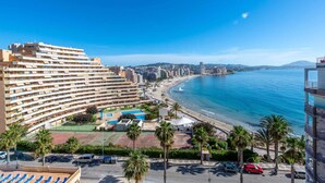 A coastal hotel with multiple floors, a pool area, and a beach view. - mizzen 84, 3 bedrooms (Calpe/Calp)