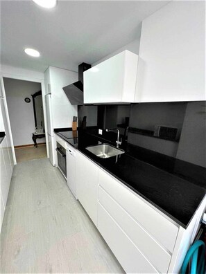 Fridge, microwave, toaster, cookware/dishes/utensils