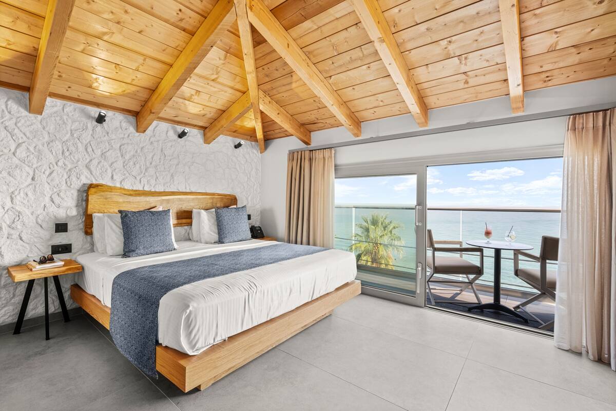 Sea View Junior Suite | Hypo-allergenic bedding available, in-room safe, blackout drapes