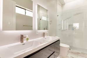 Combined shower/tub, hair dryer, towels, soap