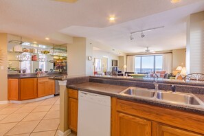 Fridge, microwave, oven, stovetop - Gulf Front Condo | Outdoor & Indoor Pools! (Orange Beach)