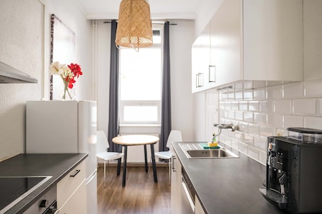 Fridge, stovetop, coffee/tea maker, electric kettle. Stylish Apartment in convinient location