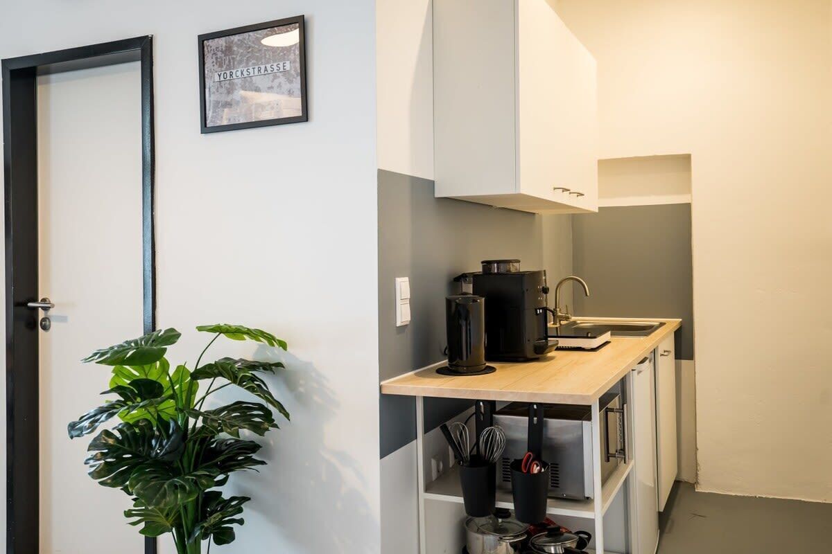 Fridge, stovetop, coffee/tea maker, cookware/dishes/utensils