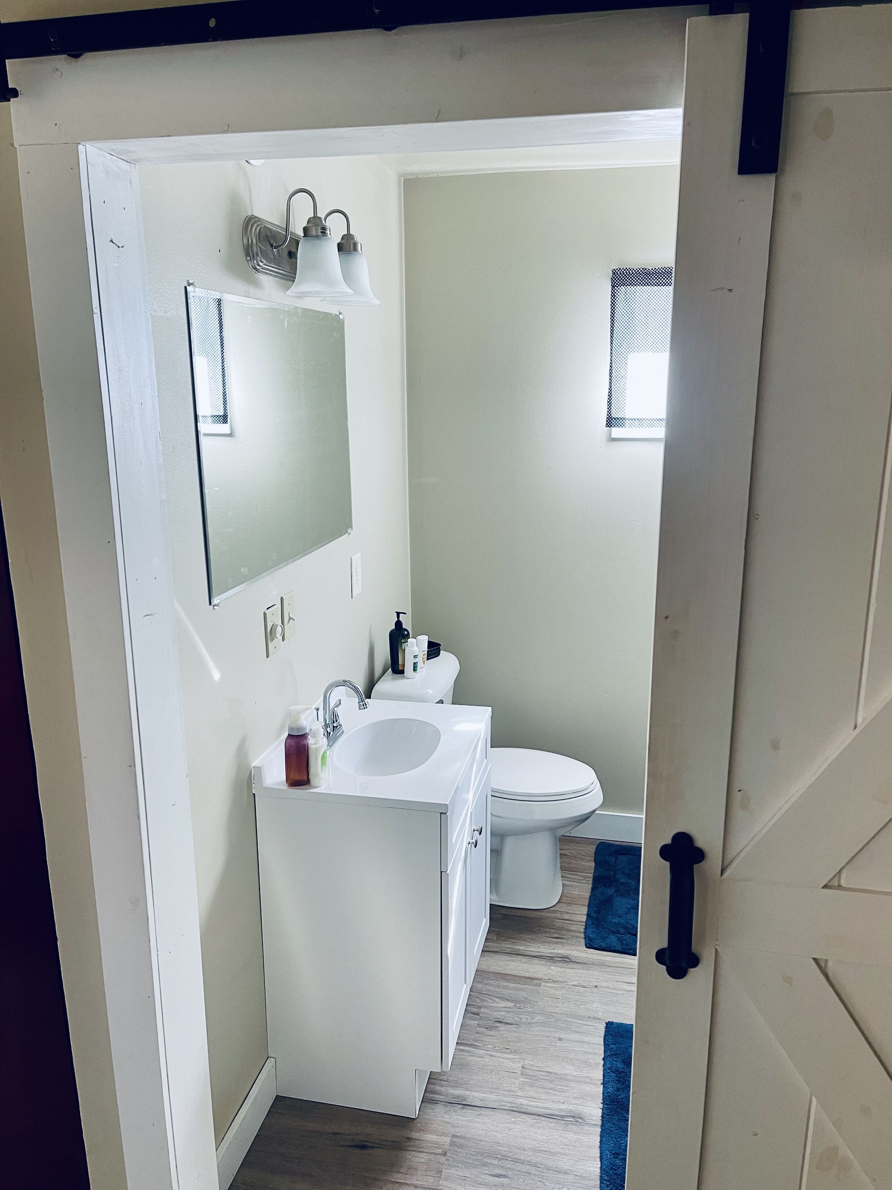 Combined shower/tub, hair dryer, towels, soap
