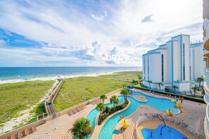 A resort with a pool area, beach access, and a view of the ocean. - 🌊☀Phoenix Orange Beach II 405 - Beautiful Gulf Front Condo at BRAND NEW PhOB2☀🌊 (Orange Beach)