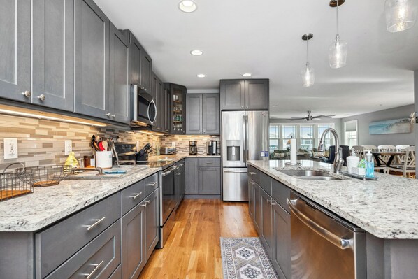 Fridge, microwave, oven, stovetop - Beach 45: Large, Modern Home Situated on the Davis Canal, Around 500 Feet to Bea (Oak Island)