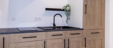 Fridge, stovetop, coffee/tea maker, toaster
