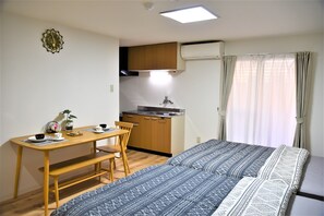 Habitación cuádruple familiar | Zona de estar