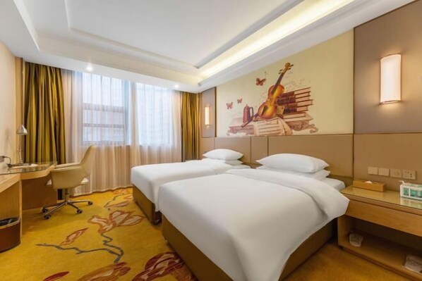 A hotel room with two beds, a desk, a chair, and a mural of a guitar and books. - Vienna Hotel (Ganzhou Railway Station Wanda Plaza Branch) (Ganzhou)