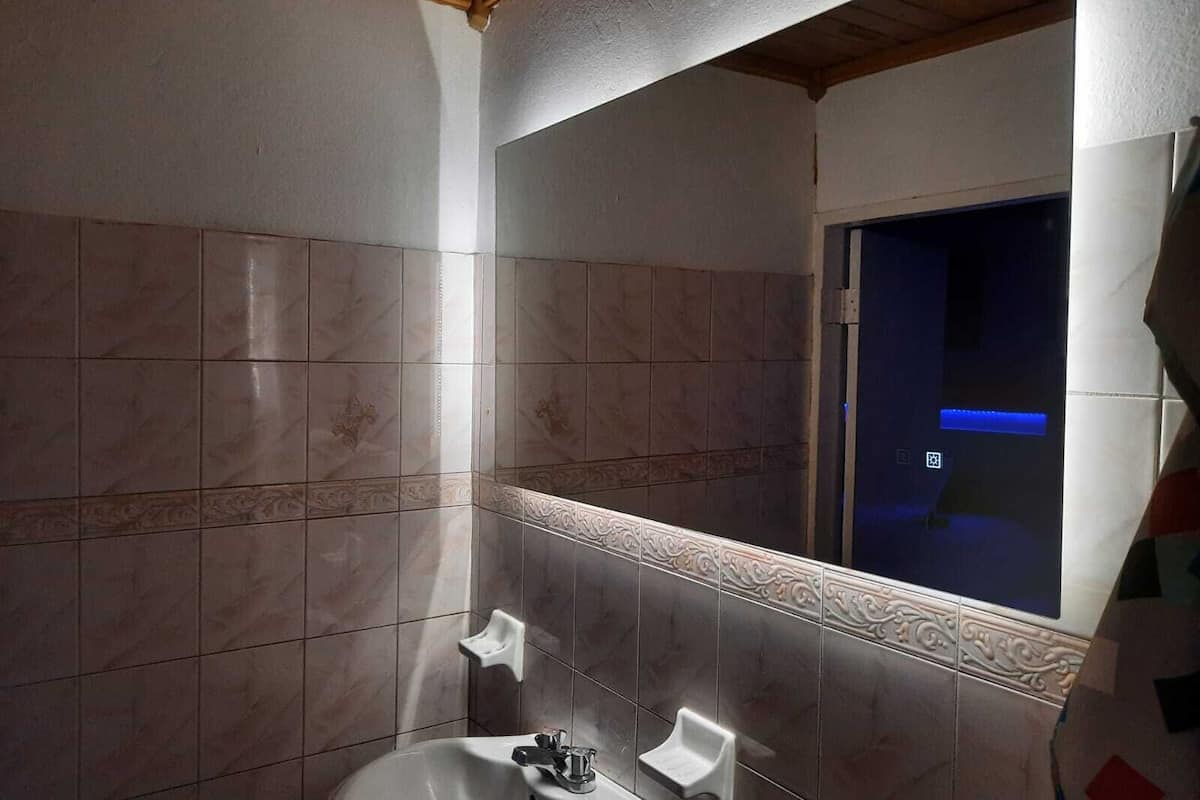 grand suite, multiple beds, ocean view | bathroom | shower, towels