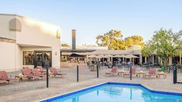 Outdoor pool, open 7:00 AM to 7:00 PM, sun loungers