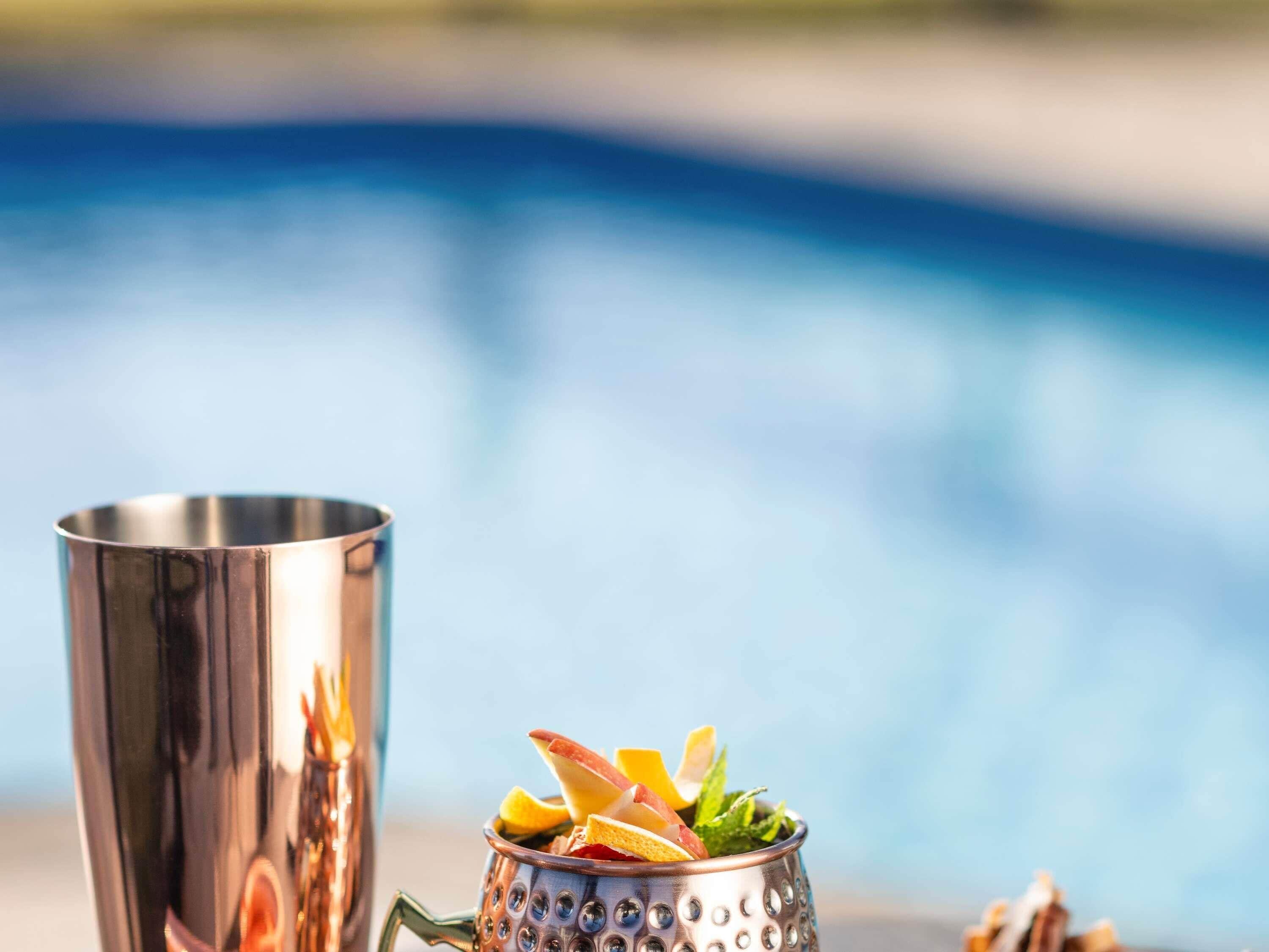 Outdoor pool, open 7:00 AM to 7:00 PM, sun loungers