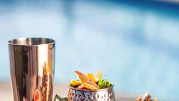 Outdoor pool, open 7:00 AM to 7:00 PM, sun loungers