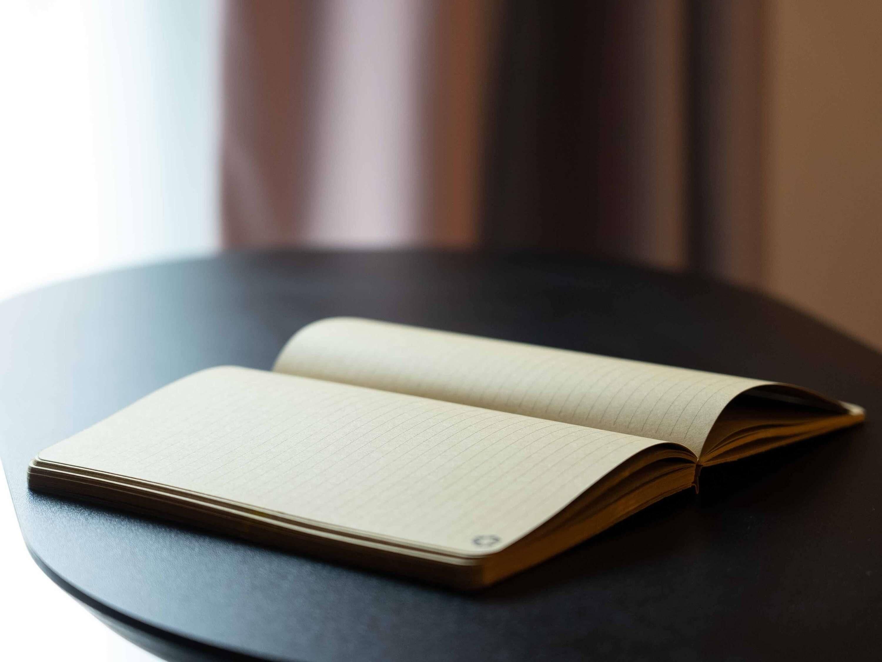 A book on a round table.