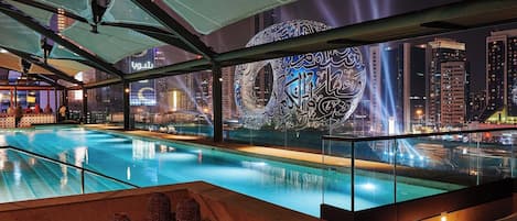 Outdoor pool, open 6:00 AM to 10:00 PM, pool umbrellas, sun loungers