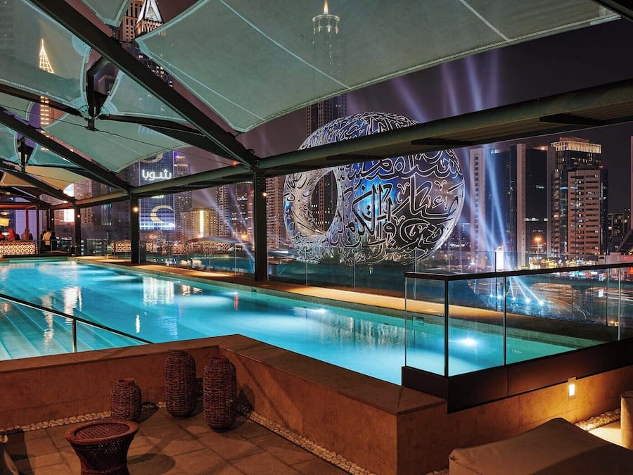 Outdoor pool, open 6:00 AM to 10:00 PM, pool umbrellas, pool loungers