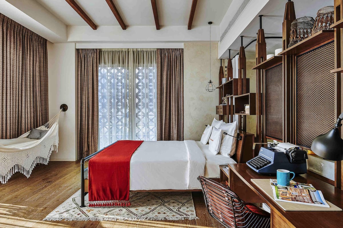 Suite | Ropa de cama de alta calidad y artículos del minibar gratis