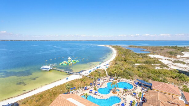 A resort with a large swimming pool, beach access, and a pier. - P4-1304 Pristine 3B Gulf View in Tower 4! (Pensacola Beach)