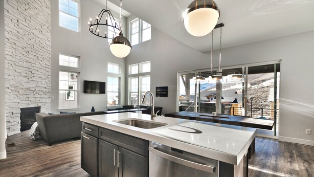 A spacious kitchen with a large island, stainless steel appliances, and a modern farmhouse aesthetic. - Gorgeous Jordanelle Lake Property - 4BD/3.5BA (Hideout)