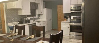 Large home with pool, trampoline, fire pit, and deck!