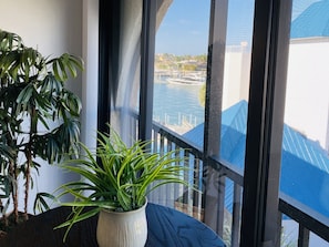 Enjoy a serene view of the marina from this room's large window.